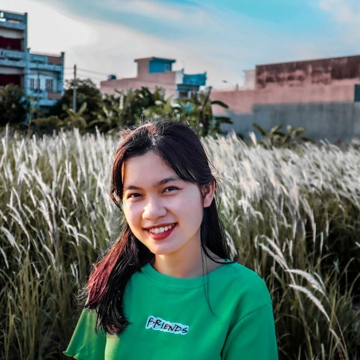 Kaveri Mehta, Lead Design Curator at Timber Paper Lane, reviewing corporate floral arrangements